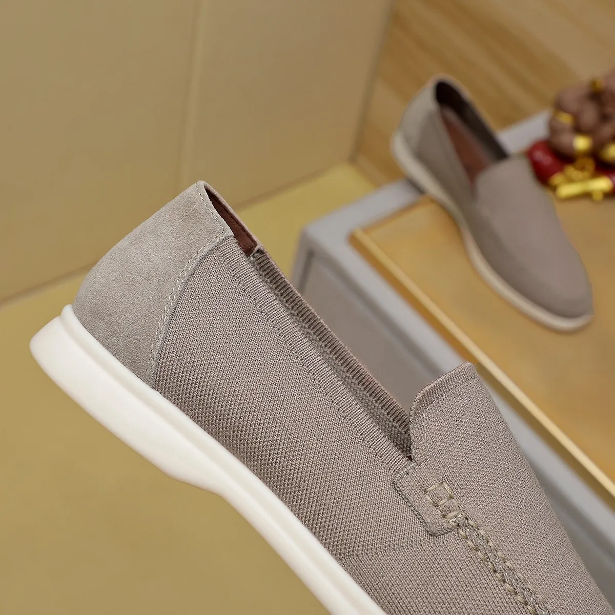 Men's Men's Shoes 💰 400 Loro PIana moccasin made of wish wool fabric. The upper is made of knitted fabric, made on a loom, and then attached to a rubber sole. The Rain System's water-repellent treatment enhances the shoe's functional design, while the suede details give the shoe a sense of elegance and sophistication. Made from Wish, fine wool from Australian and New Zealand Merino sheep 38-44